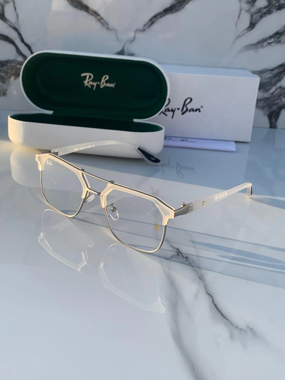 Ray-Ban 04 white plano eyeglasses.