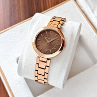Michael Kors rose gold-toned analog ladies watch
