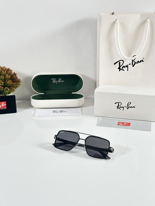 Ray-Ban sunglasses with a gunmetal frame and dark blue polarized lenses.