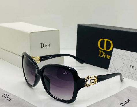 black Dior women's sunglasses with gold-tone hardware and gradient lenses.