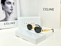Celine Oval Triomphe Metal sunglasses in gold with green lenses