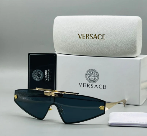 Versace VE2265 shield sunglasses with a gold metal frame and dark grey lenses.