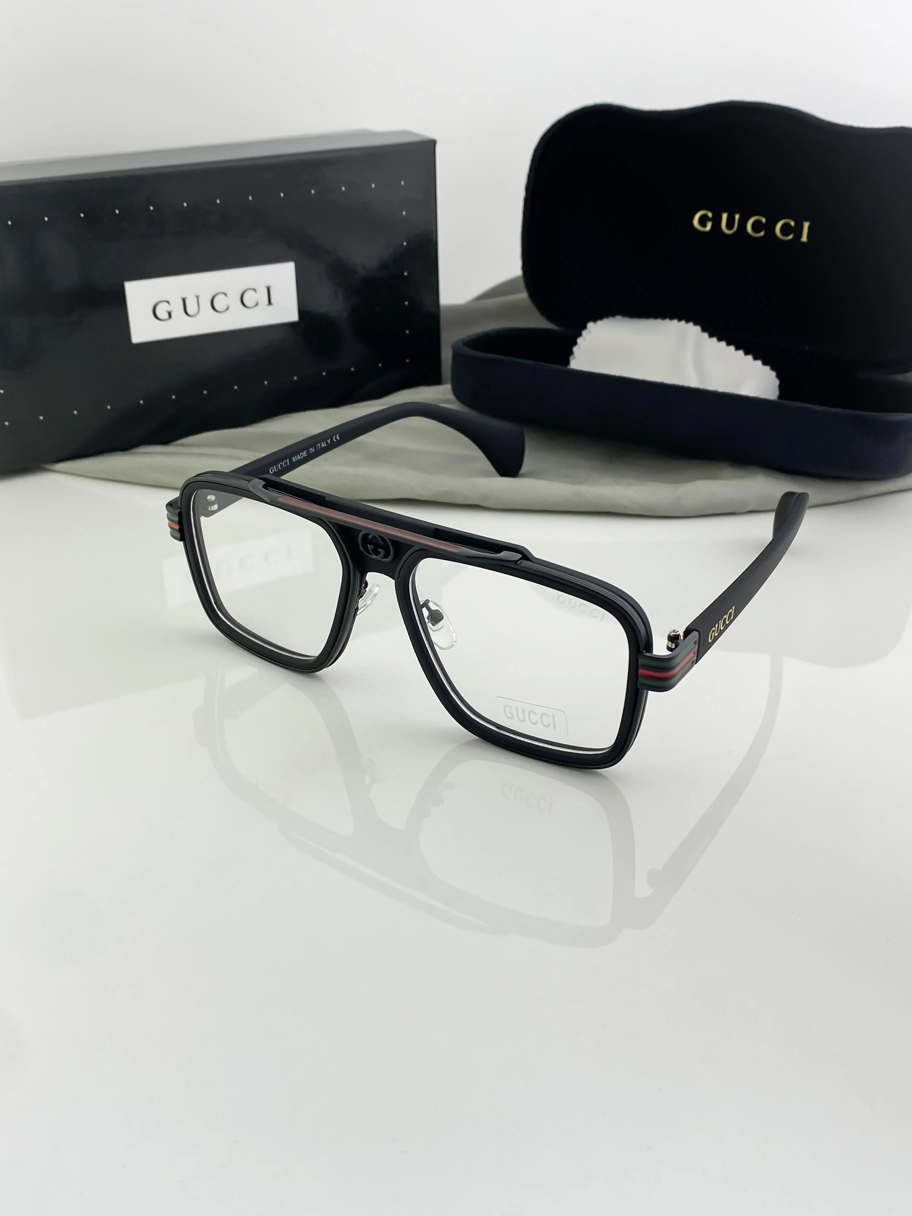 black Gucci GG0026O acetate aviator-style eyeglasses.
