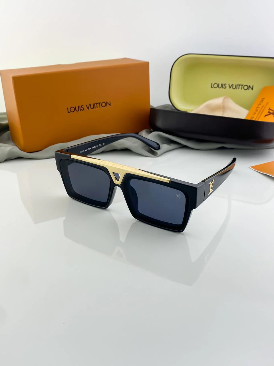 Louis Vuitton 1.1 Evidence sunglasses in black with gold-color hardware.